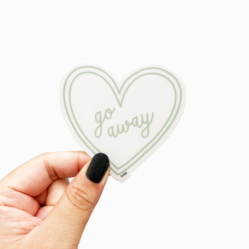 A funny sticker featuring a mint double heart and text that reads, Go away.