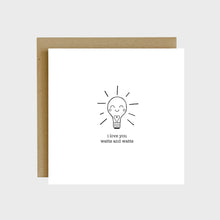 Load image into Gallery viewer, A funny greeting card featuring a lit light bulb with a heart inside and text that reads, I love you watts and watts.
