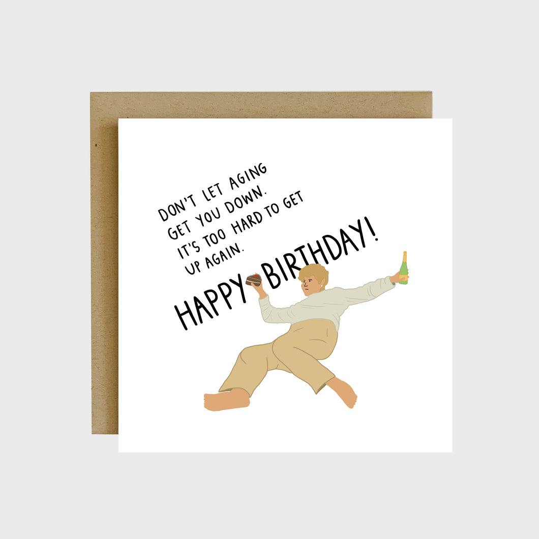 A funny greeting card featuring a drawing of the popular I’ve fallen and I can’t get up meme with text that reads, Don’t let aging get you down. It’s too hard to get up again. Happy Birthday! 