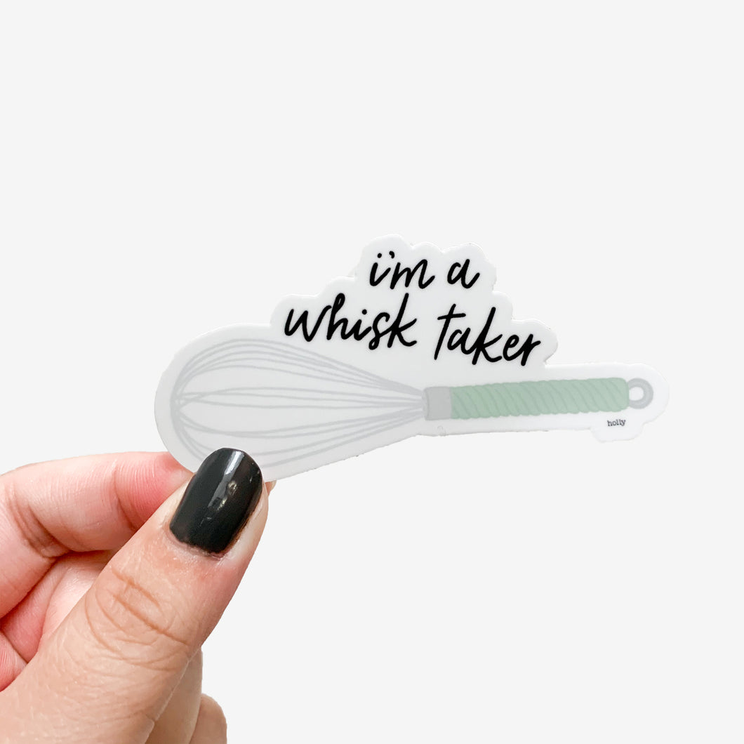 A funny pun sticker featuring a silver whisk with a mint handle and text that reads, I’m a whisk taker.