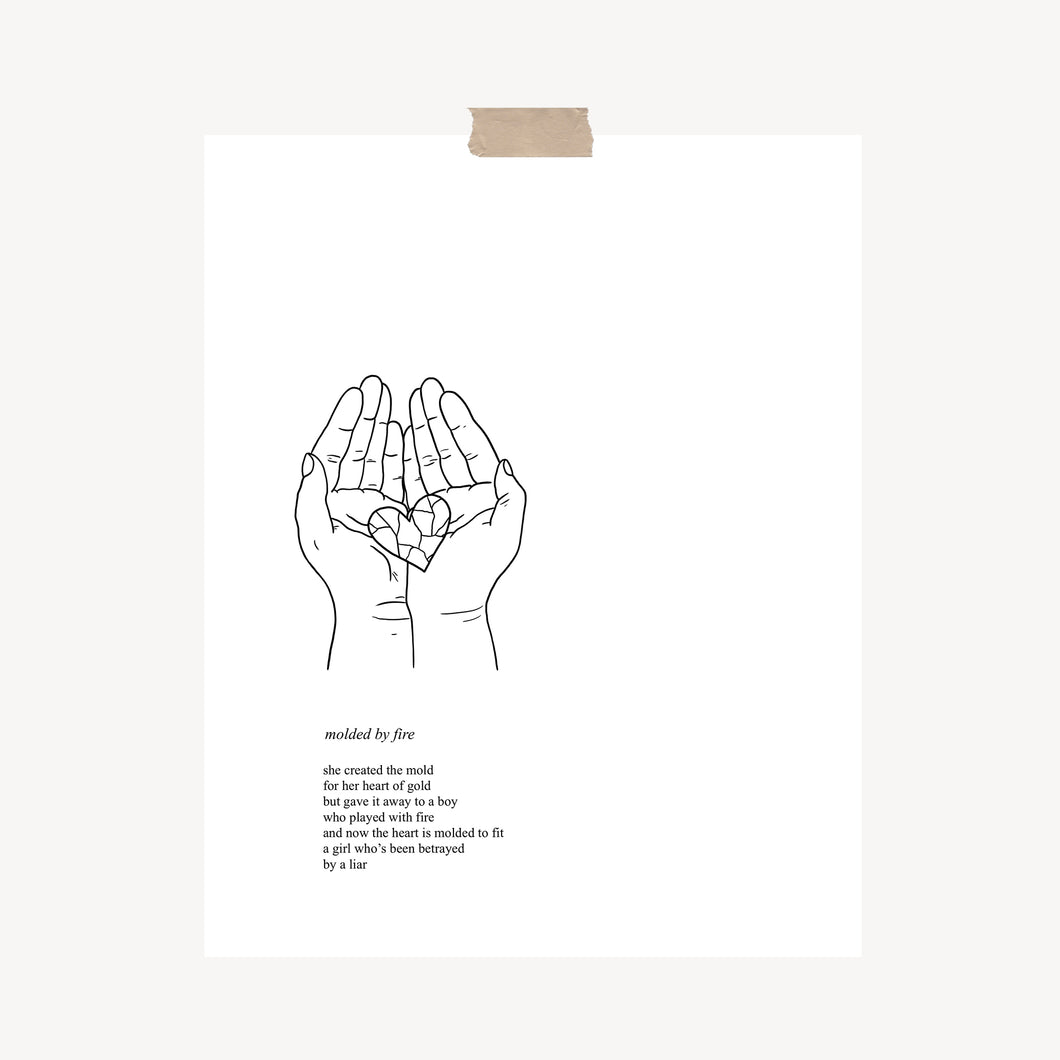 An art print featuring a poem called, “Molded By Fire” with original artwork of two hands together holding a broken heart pieced back together hung with a piece of kraft tape on the top.