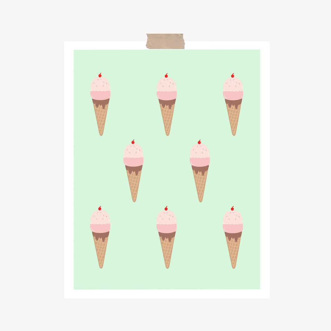 An art print featuring a bunch of strawberry ice cream with a cherry on top in a chocolate dipped waffle cone in front of a mint background hung with a piece of kraft tape on the top.